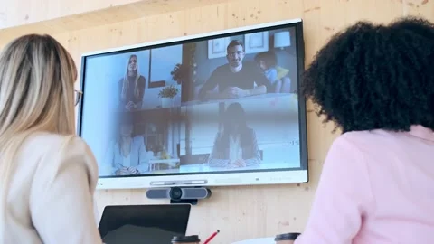 Video of multiethnic entrepreneurs doing a working video call with their coll Stock Footage 157179257