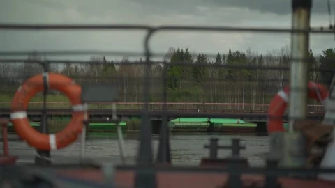 Video from the nose floating down the river ship. The Volga river, summer day Stock Footage 130667612