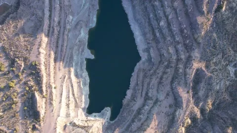 Video of an old open pit uranium mine. Aerial view. Zenith view. Stock Footage 246224597