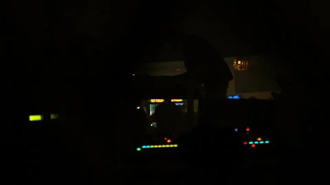 Video operator shooting DJ set concert at night silhouette scene videographer Stock Footage 111839906