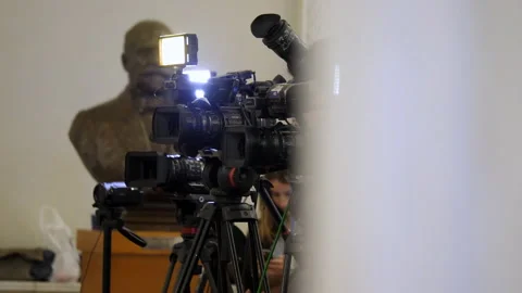 Video Operators With Camcorders Broadcast Live from Parliament. Stock Footage 134031971