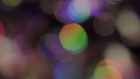 Video overlay of prismatic texture movement of bokeh light on black background Stock-Footage 317477848
