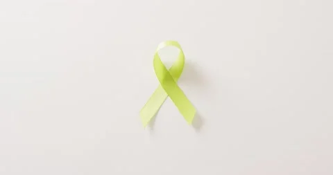 Video of pale green std awareness ribbon on white background with copy space Stock Footage 221799753