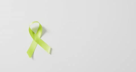 Video of pale green std awareness ribbon on white background with copy space Stock Footage 221952393
