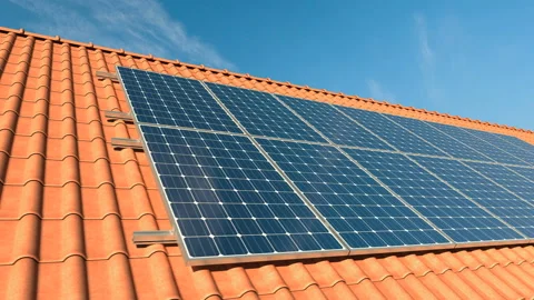 Video panning of solar panels modules on roof on a clear day Stock Footage 139985158