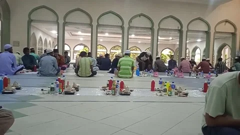 Video of People Waiting For Iftar Time at The Mosque And the Food Available Stock Footage 305771480