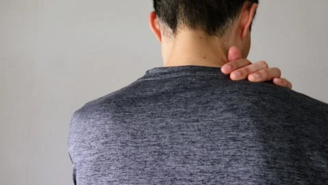 Video of a person applying a compress to their body Stock Footage 324541487