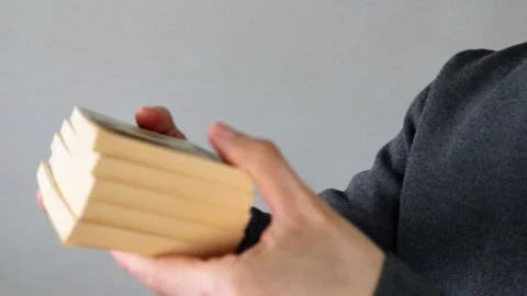 Video of a person receiving a stack of bills Video stock 324547493