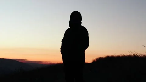 Video of a person running through the mountains of Peru at sunset. Stock Footage 249232236