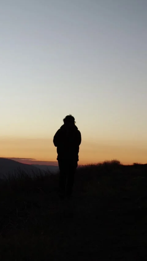 Video of a person running through the mountains of Peru at sunset. Stock Footage 249232591