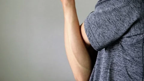 Video of a person stretching 動画素材 324541411