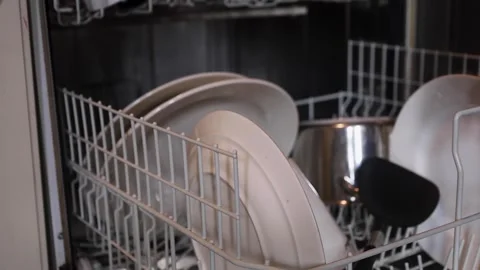Video of a person unloading the dishwasher. Stock Footage 335122513
