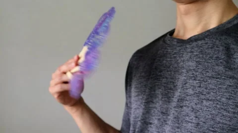 Video of a person using a folding fan Stock Footage 323503187