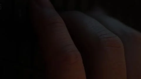 Video of a person using a laptop to check cryptocurrency charts while typing Video stock 322095848