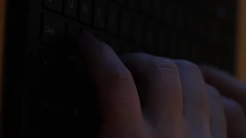 Video of a person using a laptop to check cryptocurrency charts while typing Stock-Footage 322095849