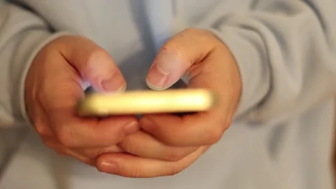 Video of a person using a laptop to check cryptocurrency charts while typing Stock Footage 322095881