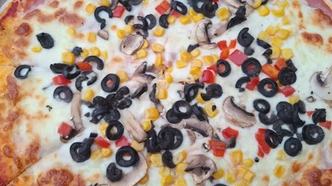Video of pizza with ham, cheese, and vegetables Stock Footage 344035236