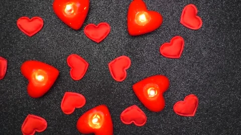 Video postcard for Valentine's Day burning candles in the shape of hearts Stock Footage 170674485