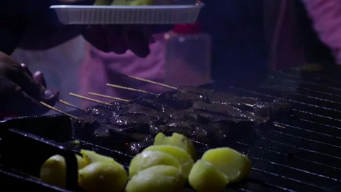Video of the preparation of anticuchos, typical Peruvian dish. Stock Footage 249230955