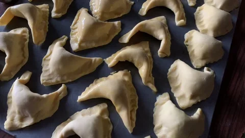 Video of preparation of small empanadas - snacks. Concept of food at events. Stock Footage 255627836