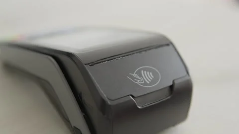 Video presents fast and convenient way to pay for goods using smartphone and NFC Stock Footage 247007998