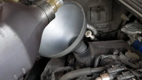 Video process of adding oil to the engine Video stock 114295076