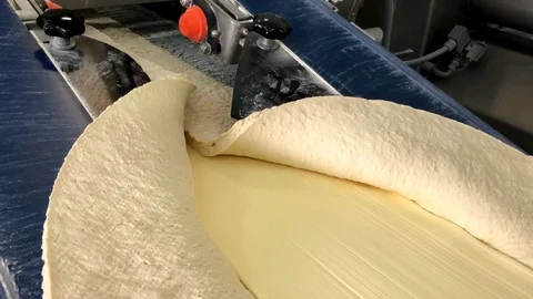 Video process of production of puff pastry and semi-finished products Video stock 99282450