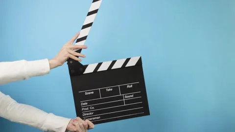 Video production process, cameraman and director using a slate for a new mo.. Stock Footage 305980214