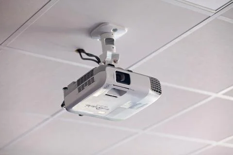 Video projector attached to the ceiling Foto stock