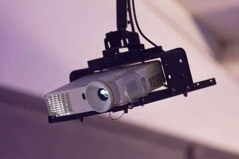 Video projector attached to the ceiling Foto stock