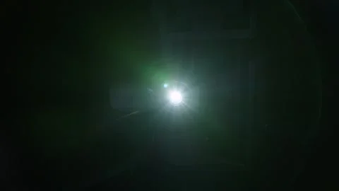 The video projector lights up and dazzles us with cold-coloured flashes of light Stock Footage 289546161