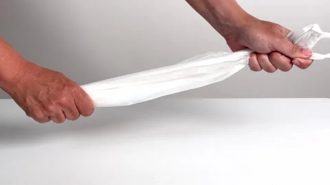  Video with real sound effect of Plastic bag tug - sharp pull Stock Footage 328601161