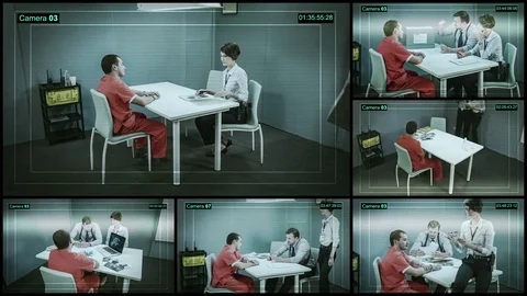 Video recorded on a surveillance camera of the suspect interrogation Stock Footage 70537390