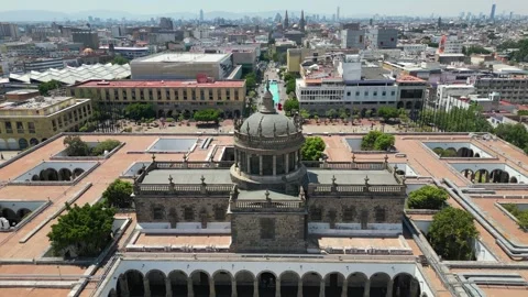Video in reverse flying over the Cabanas cultural center in Guadalajara Video stock 289590383