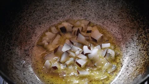 Video of roasting dried coconut in Ghee. It is used for making payasam a sout Stock Footage 138514929