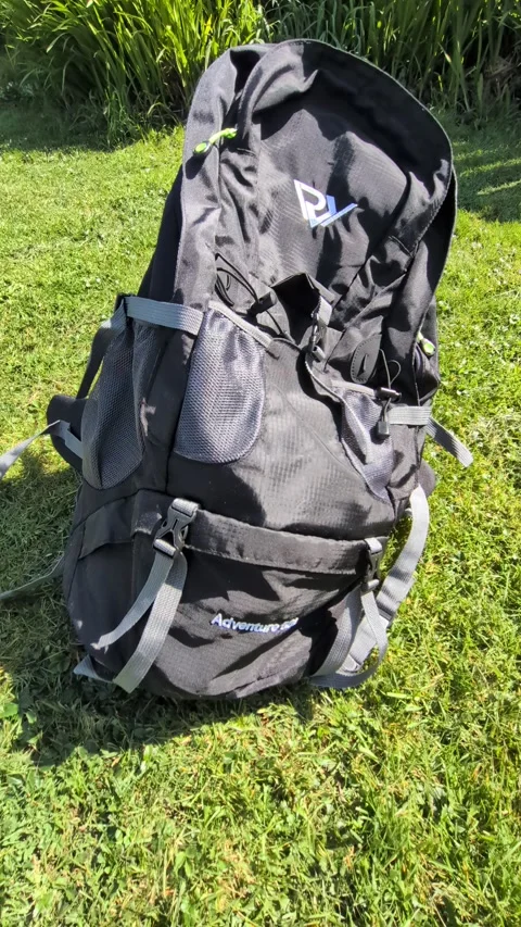 Video of rugged 50L backpack showcases multiple compartments and durable build Video stock 333483518
