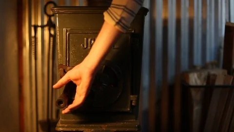 Video of rustic fire place being opened Stock Footage 106737748