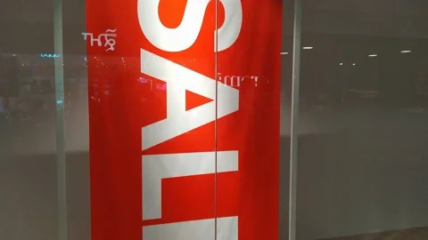 A video of a sale poster in a showroom. Stock Footage 147871853