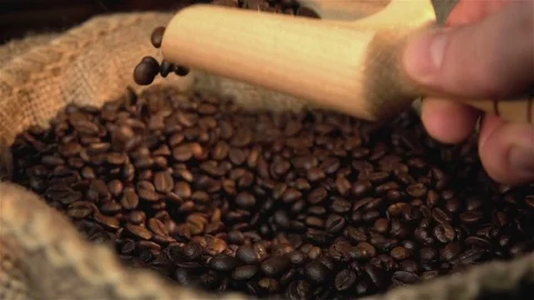 Video of scooping coffee beans in real slow motion Stock Footage 79988983