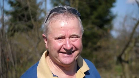 Video of senior man smiling at the camera in 4k Stock Footage 80671623