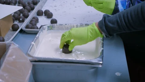Video sequence of Chocolatiers handcrafting chocolate nipples Stock Footage 108445577