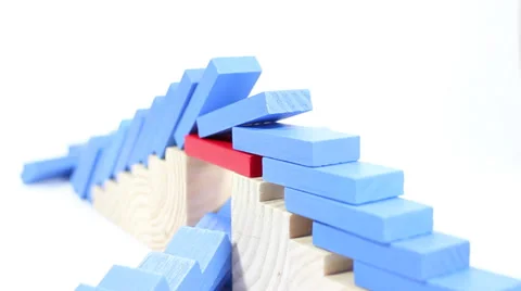 Video of a series of falling dominoes Stock Footage 27329295