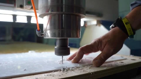 Video set: A milling machine cuts letters out of a plastic sheet. Stock Footage 286972734