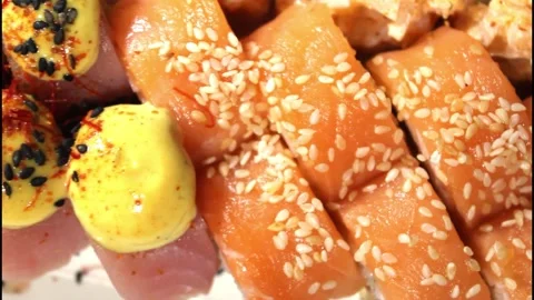 Video with a set of sushi with red fish and smoked salmon. Stock video of Stock Footage 292757752