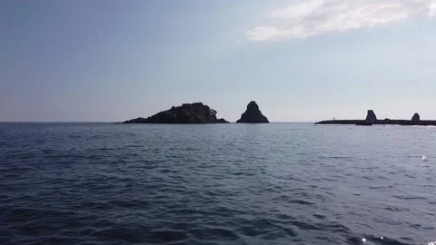 Video shooting with drone from below towards Lachea island in Sicily Video stock 146803457