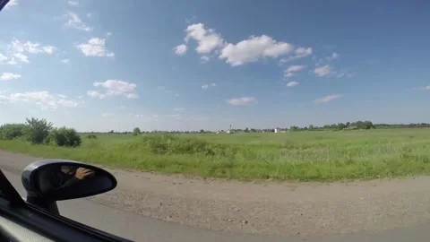 Video shooting in motion from the car window, view of the field. Russian fields. Stock Footage 156702475