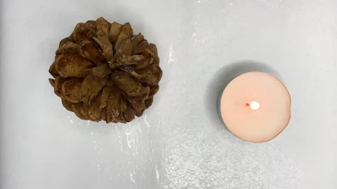 Video shooting of pine cones and candles from above Stock Footage 252188753