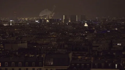 Video shot of central Paris rooftops at night with view of cityscape Stock Footage 84681551