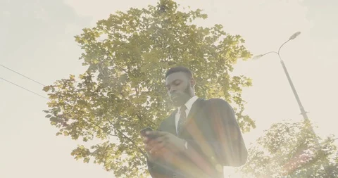Video Shot from down of Attractive Afro American Standing in the Town while Stock Footage 124655580