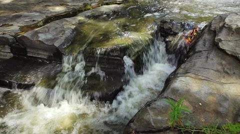 Video shot of mountain stream between stones Stock Footage 52082119